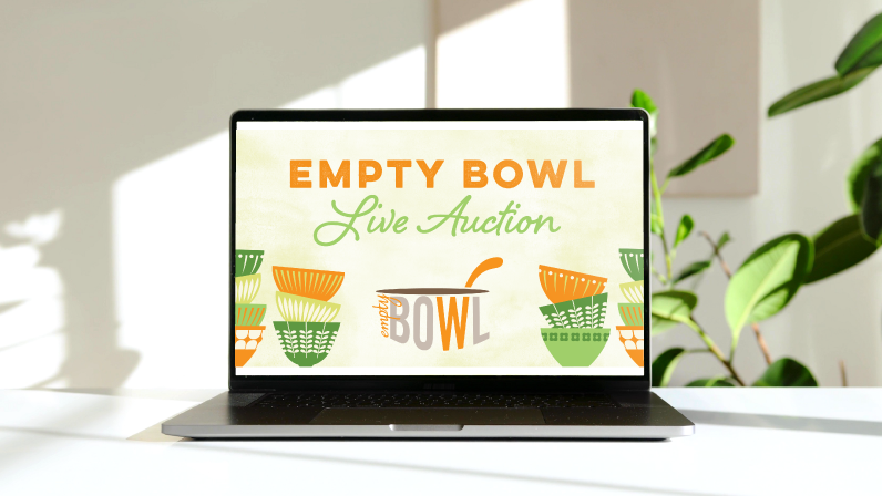 Georgia Mountain Food Bank's Empty Bowl campaign graphic presented on a laptop