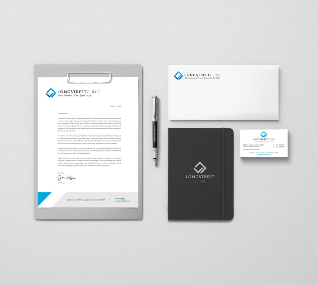 Longstreet Clinic branding samples: letterhead, business cards, pens, envelopes, and folder.