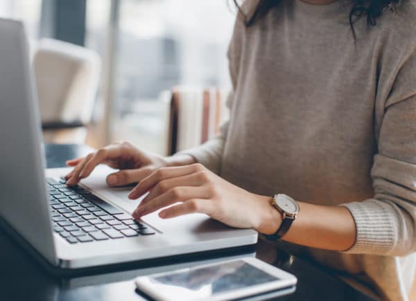 Woman using her laptop